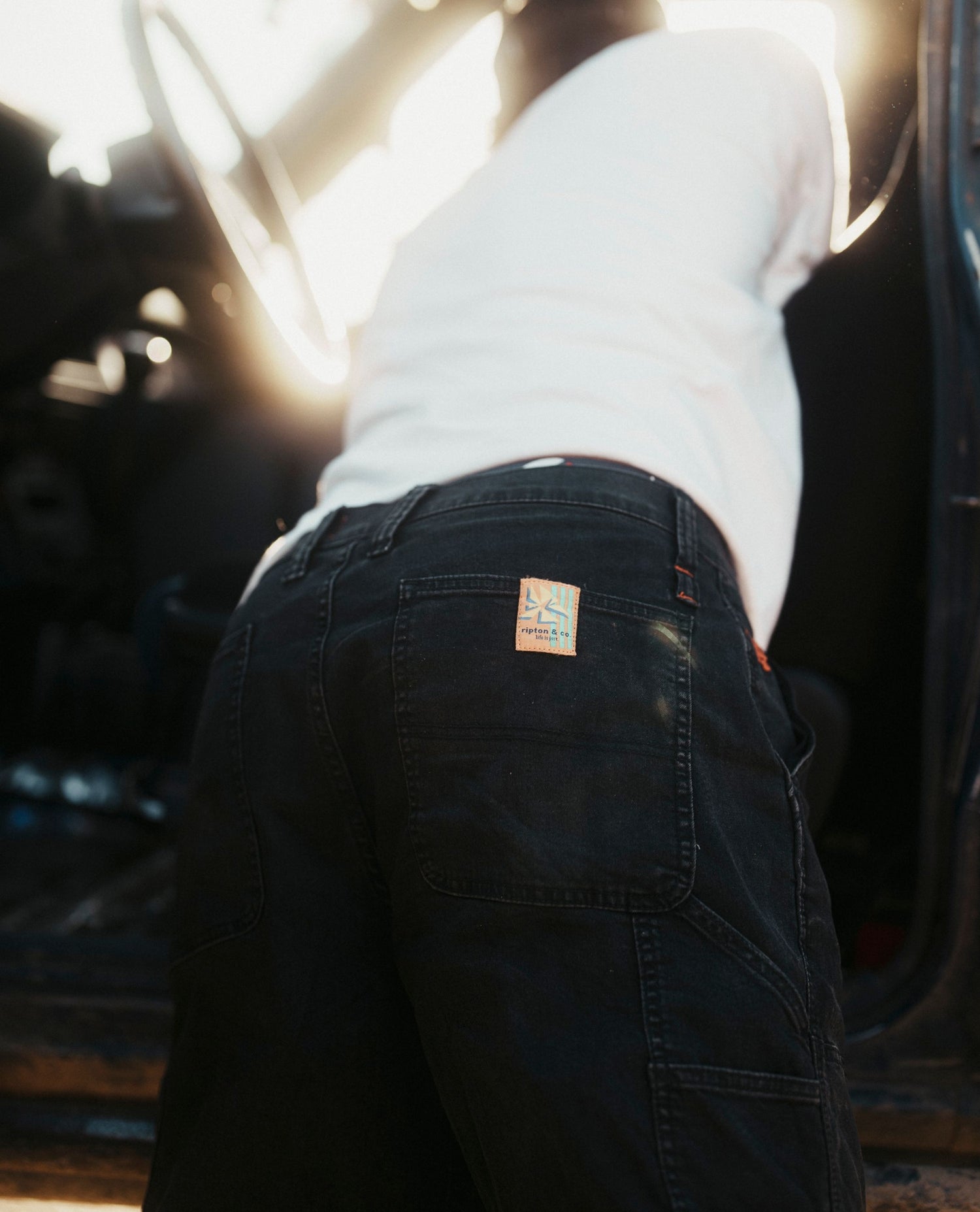 Black Superlite Utility Jeans butt on body