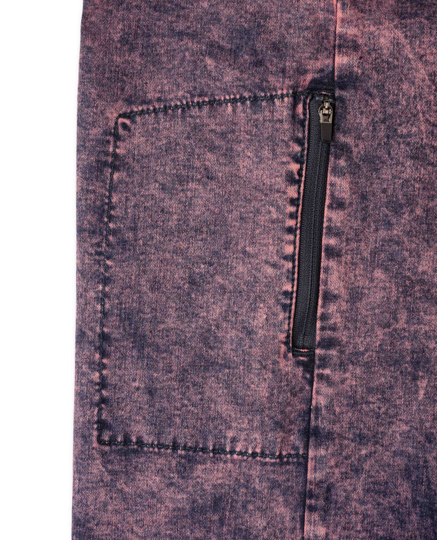 Close-up of a purple denim pocket with a zipper on a white background