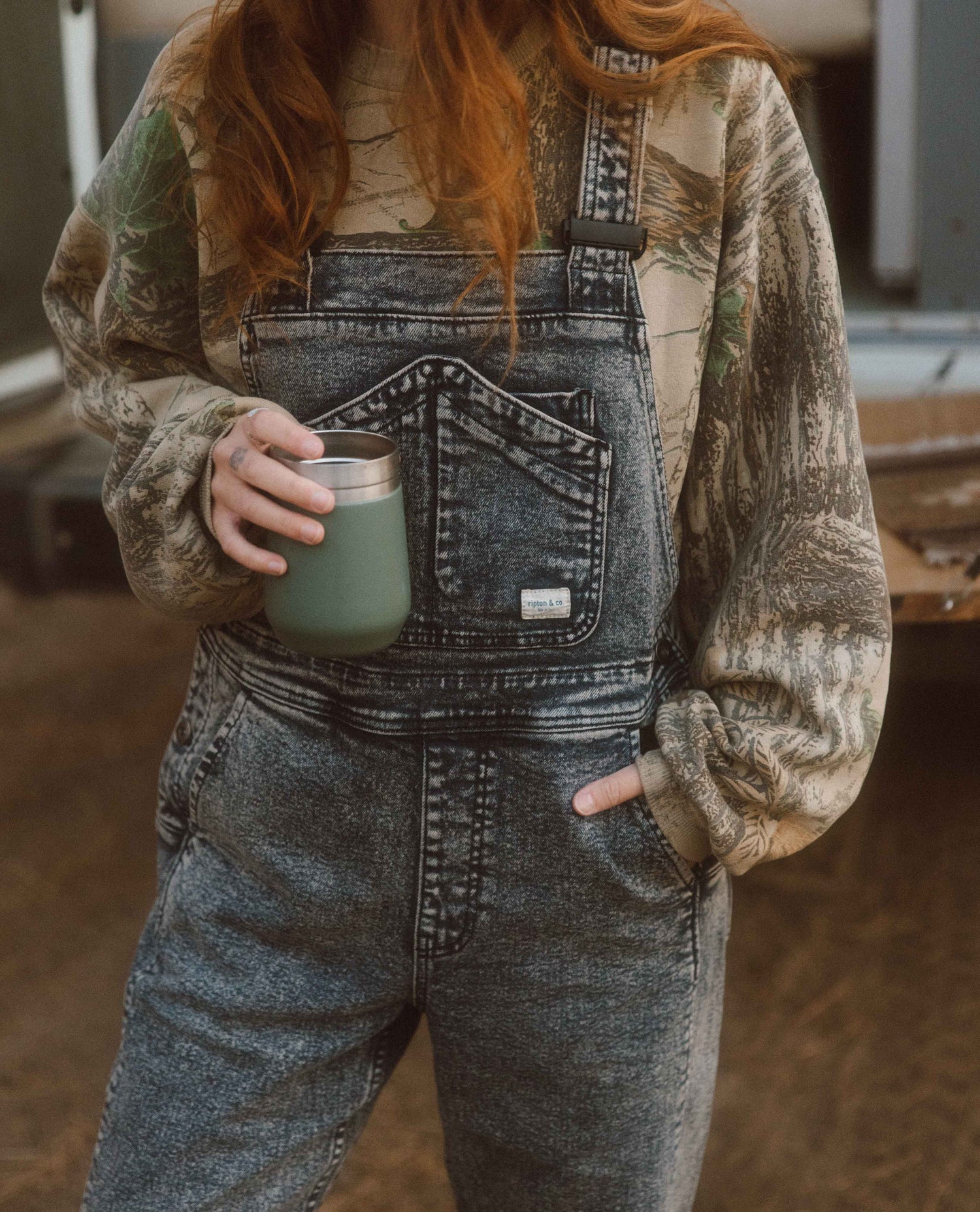 Alex wearing Starving Jartist Overalls