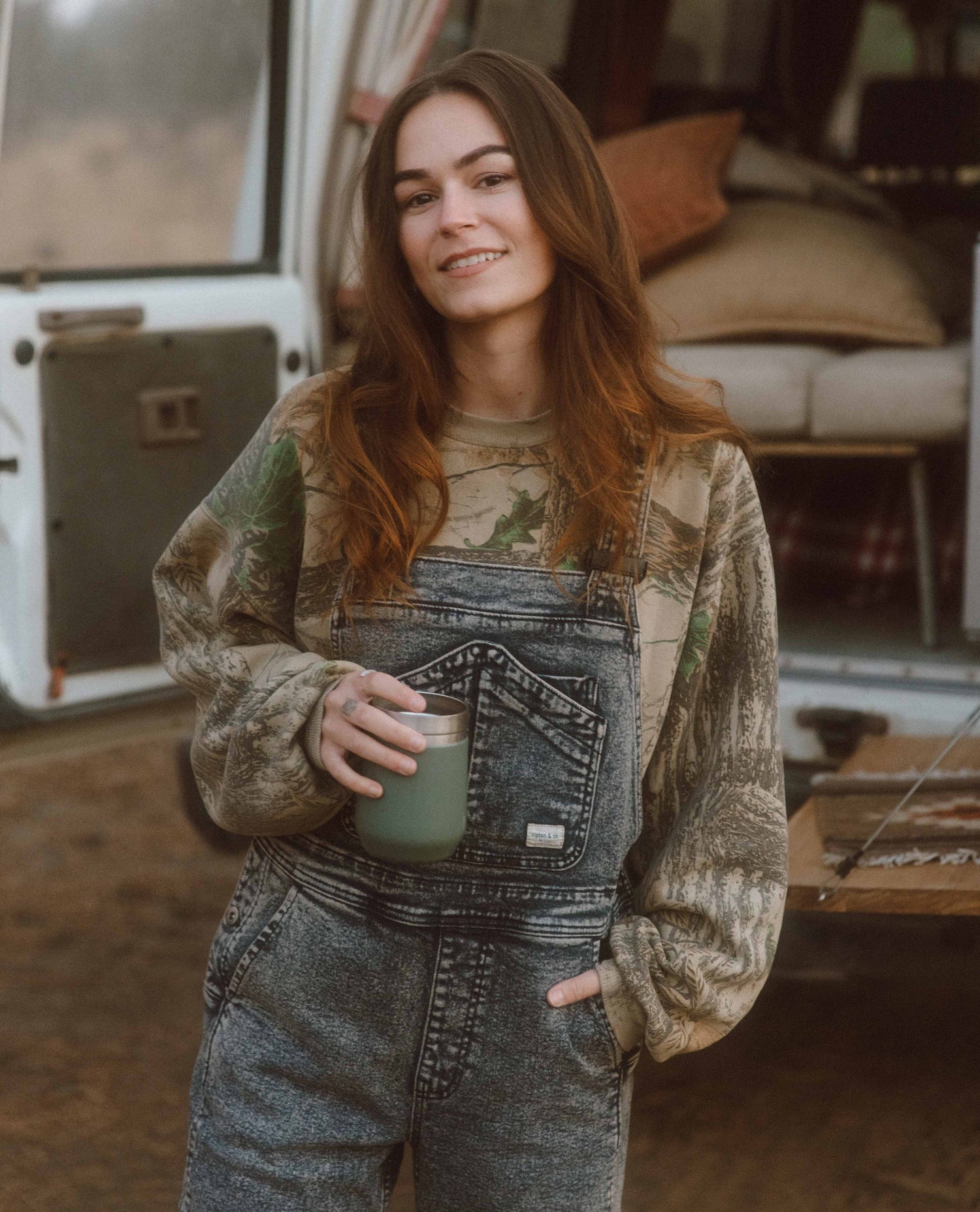 Alex wearing Starving Jartist Overalls