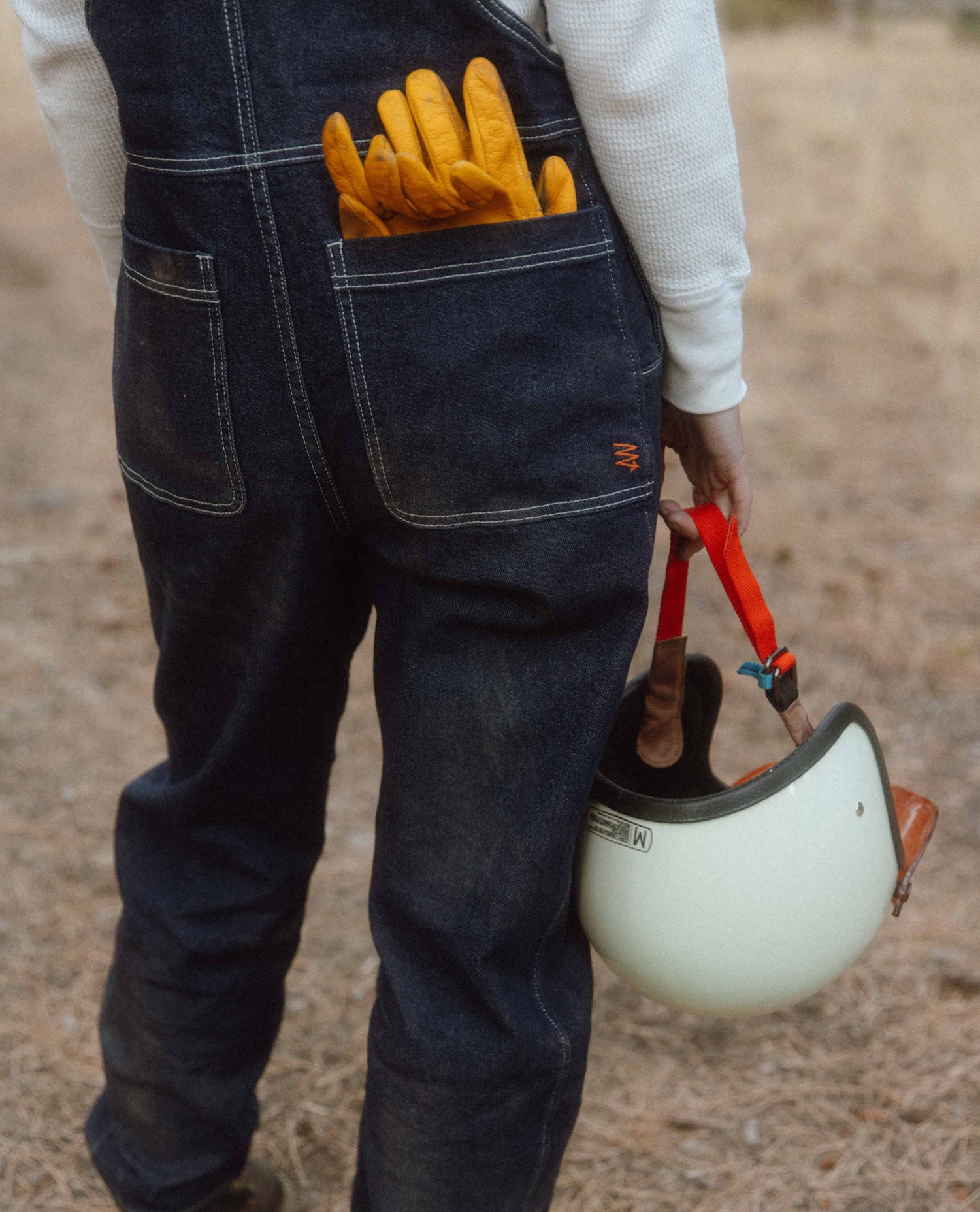 Moto rider wearing Starving Jartist Overalls