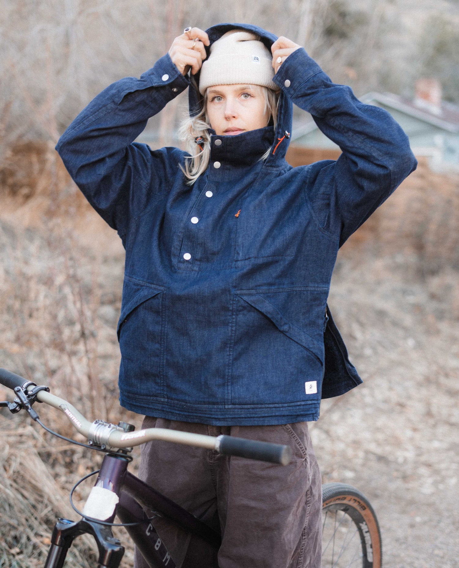 A lady wearing a denim anorak