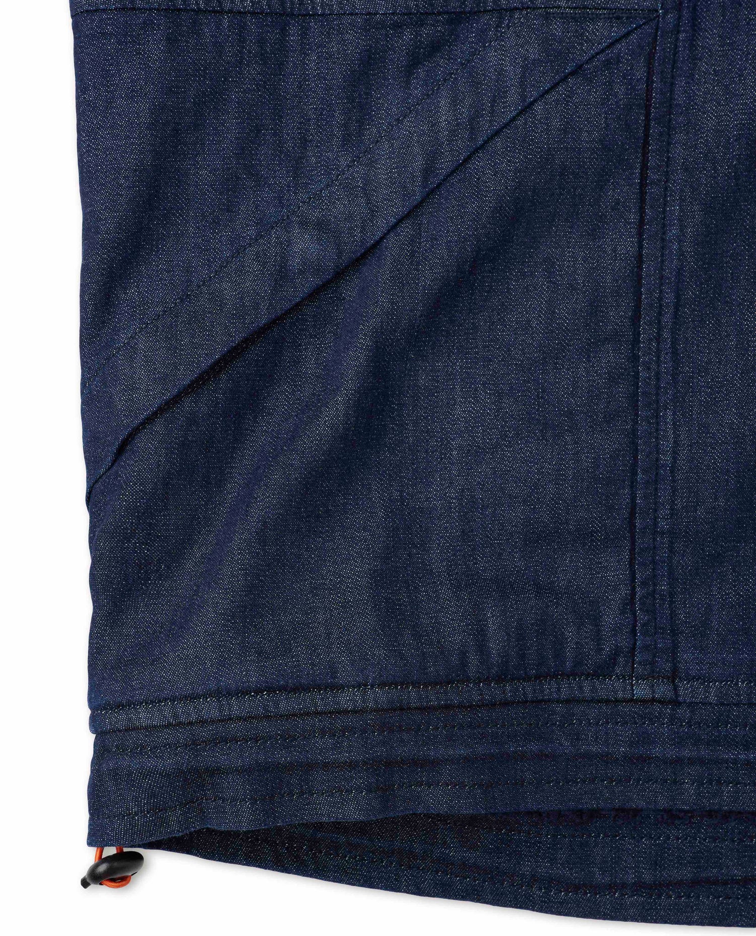 Denim anorak shot in studio pocket detail