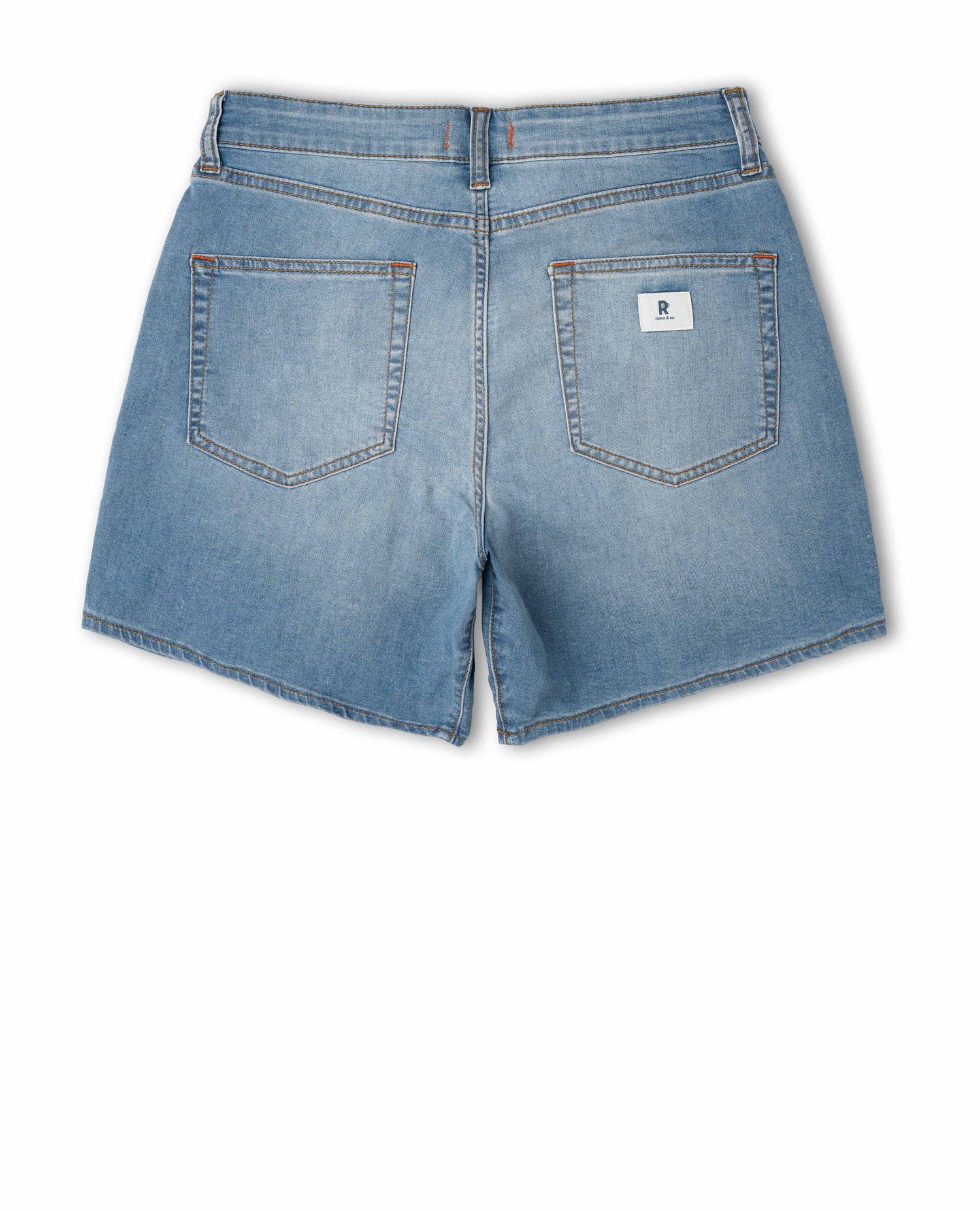 Back view of blue denim shorts on a white background