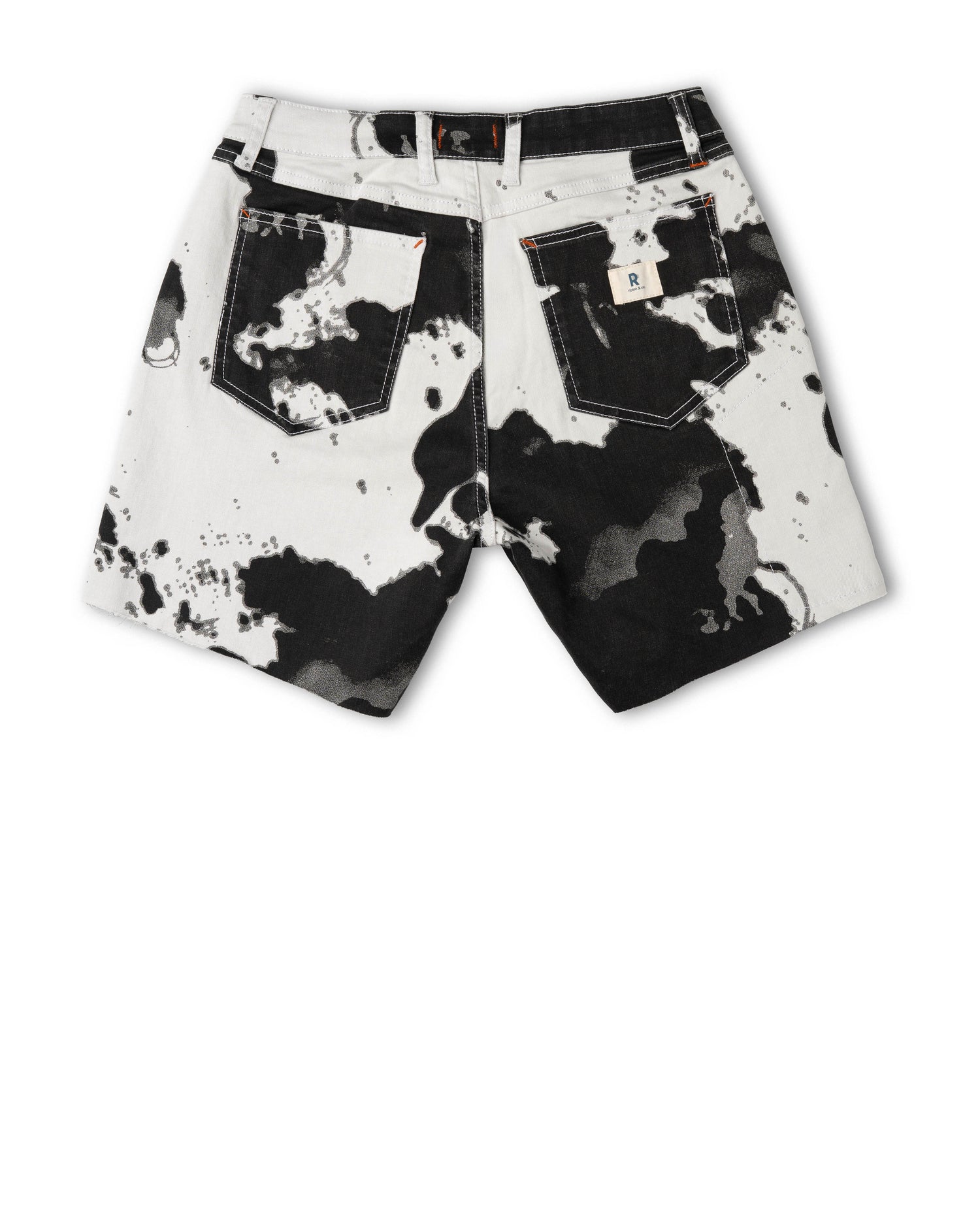 Black and white patterned shorts on a white background