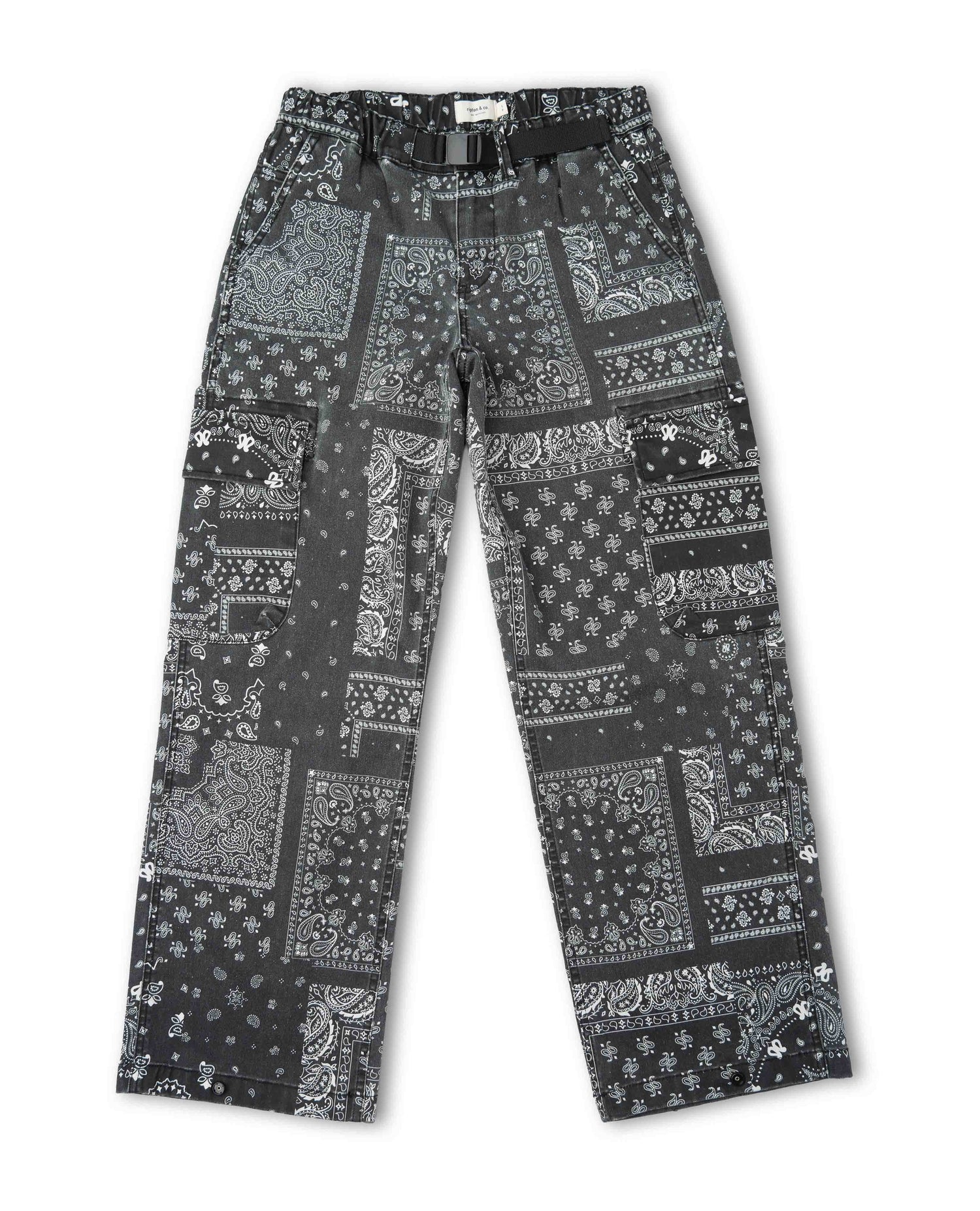 Black and white pants with paisley bandana pattern and black belt on white background