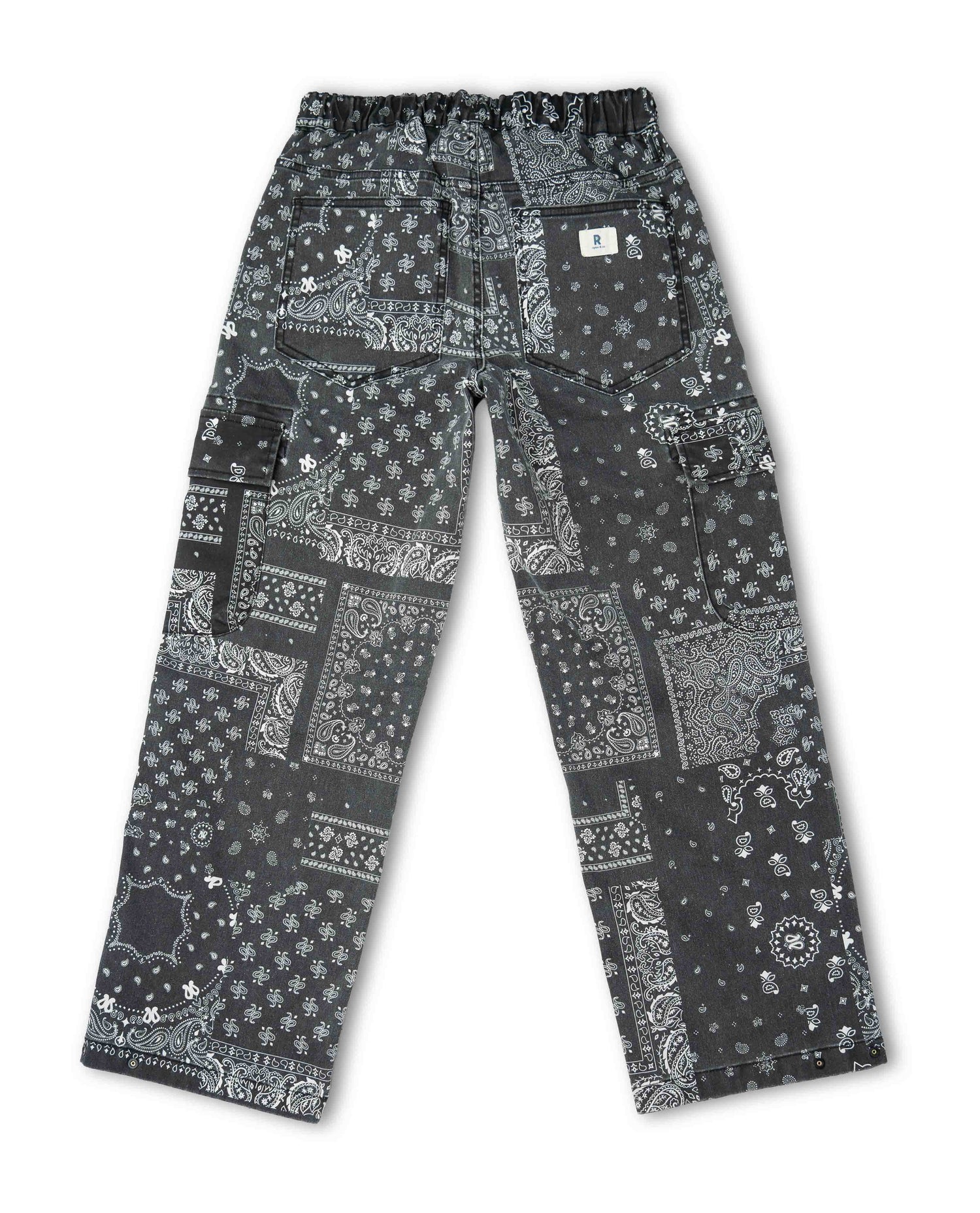 Back of black and white pants with paisley bandana pattern on white background
