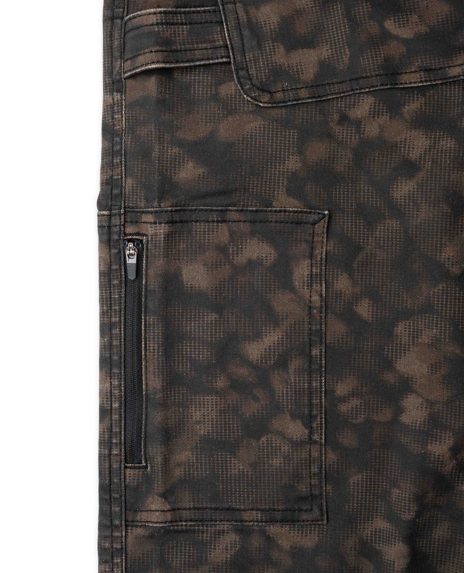 Zippered side pocket on a brown camouflage pant on a white background