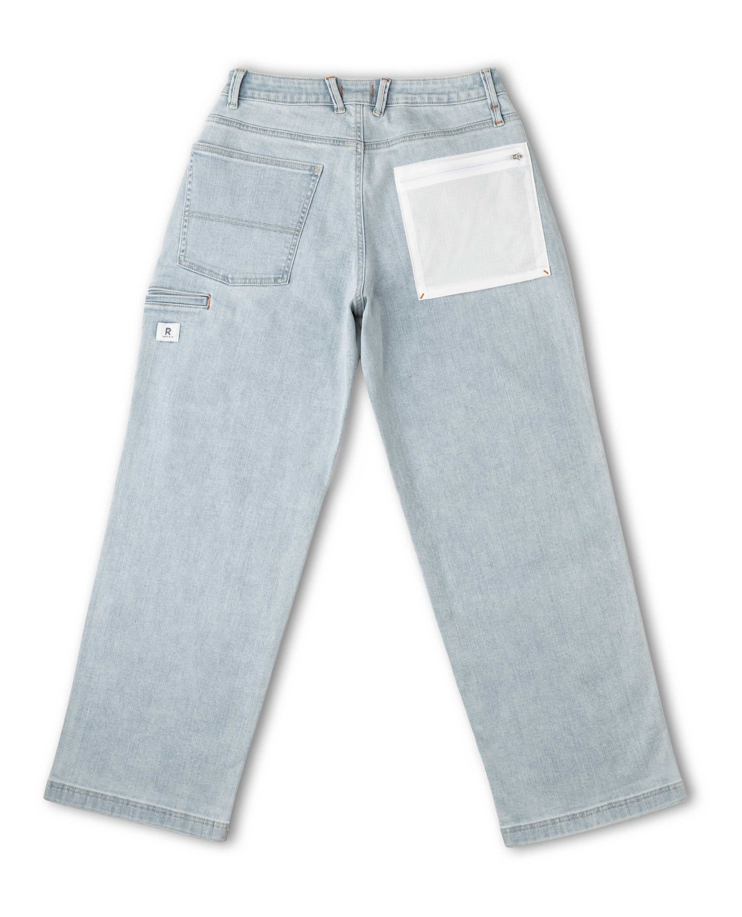 Light blue jeans with a white patch on a white background