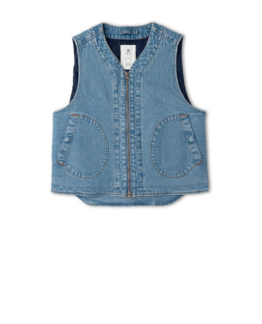 Blue denim vest on white background