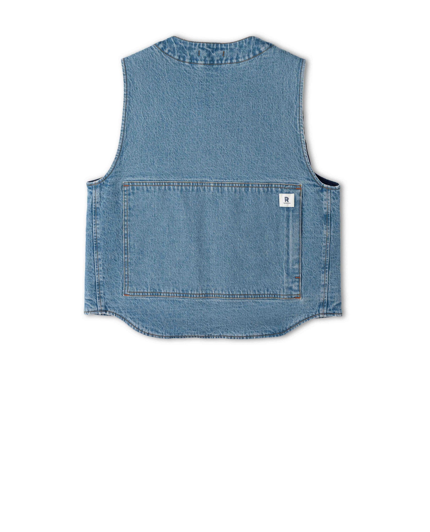 Back of a denim vest on a white bakcground