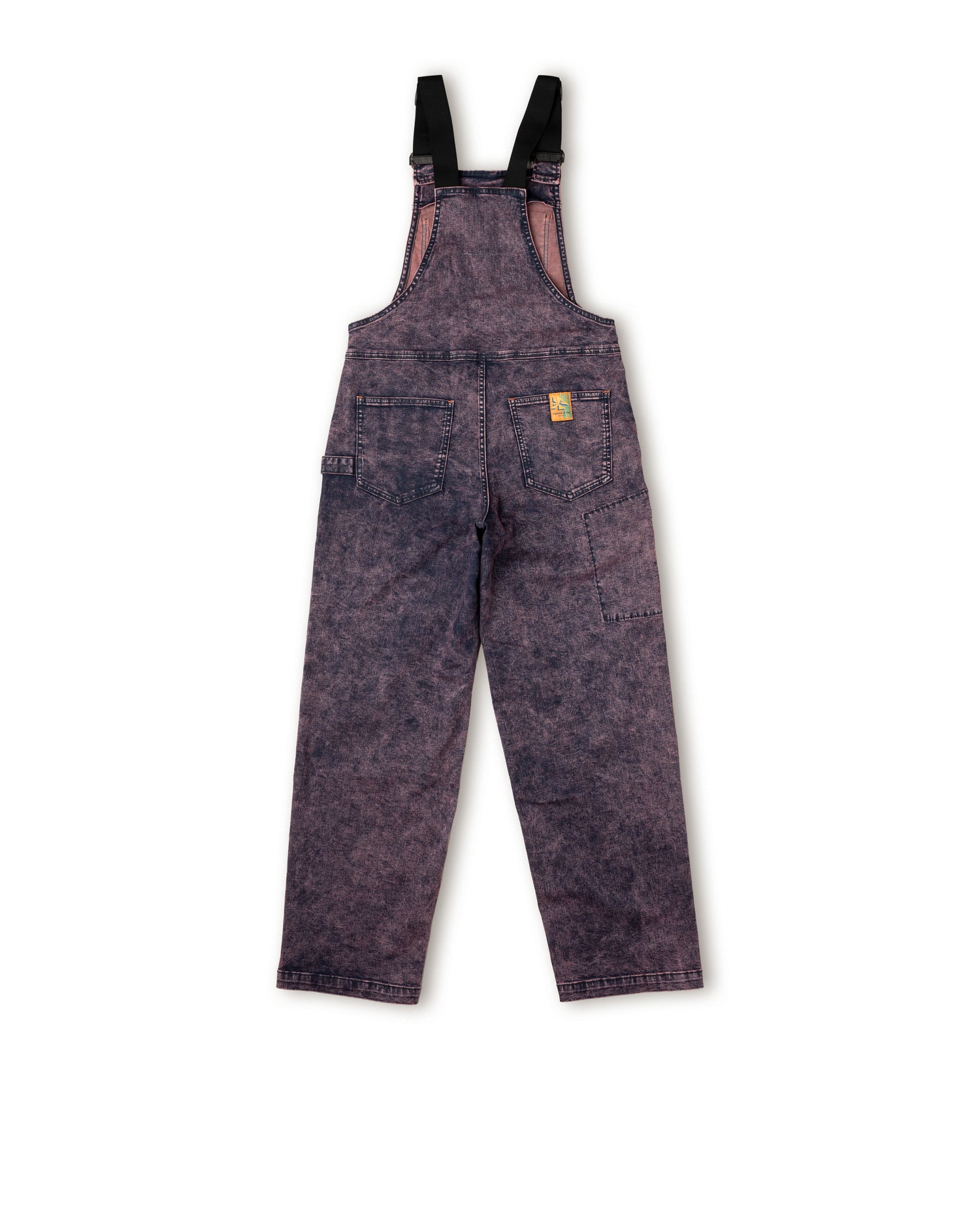 Purple denim bib overalls on a white background
