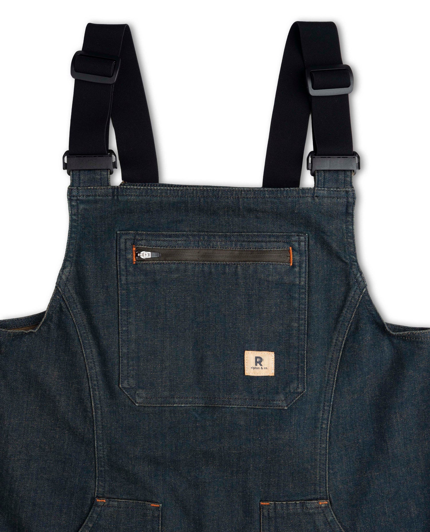 Blue denim overalls with black straps on a white background