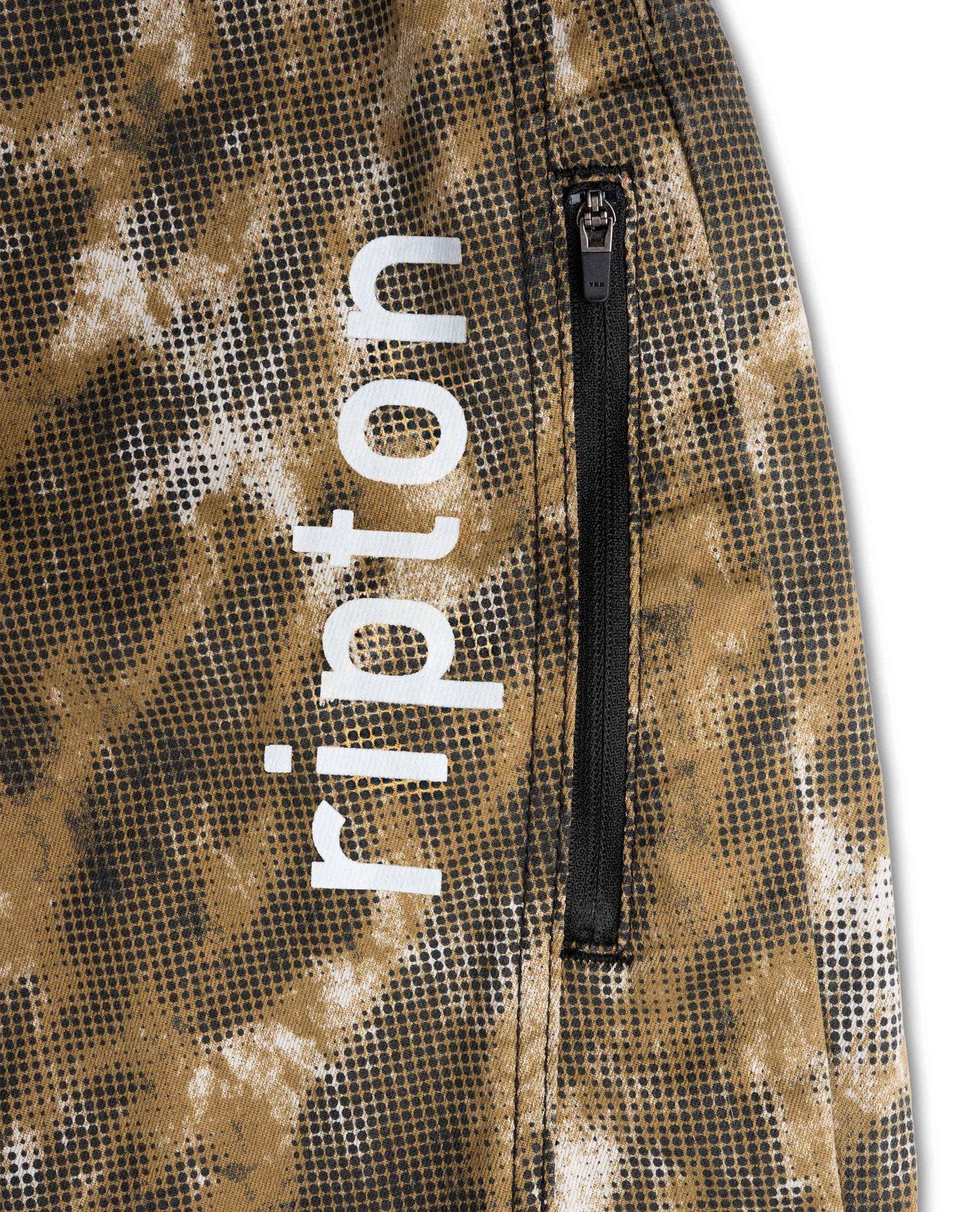 Close up of Ripton logo on the dot camo bike pant