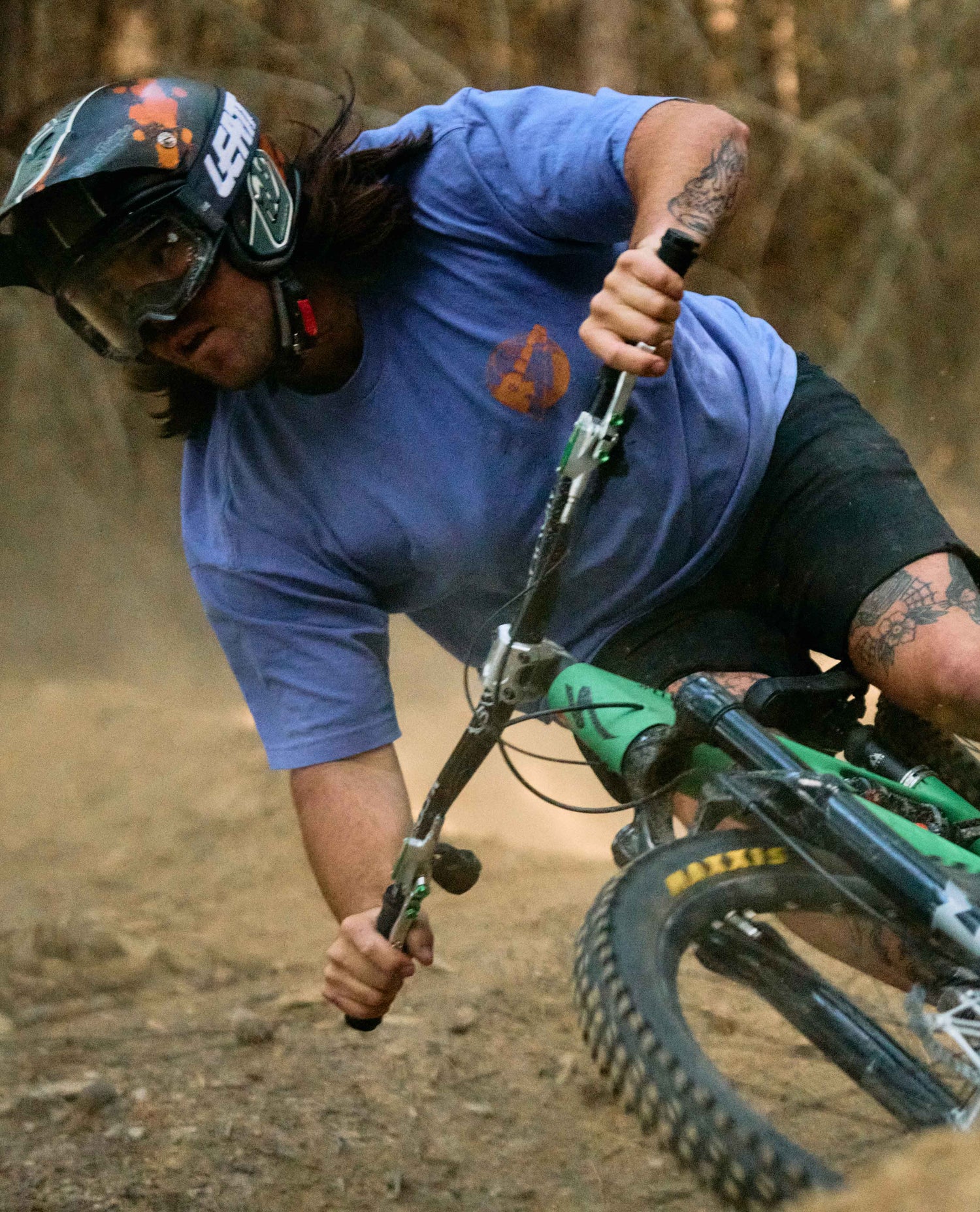 Person riding a mountain bike on a dirt trail